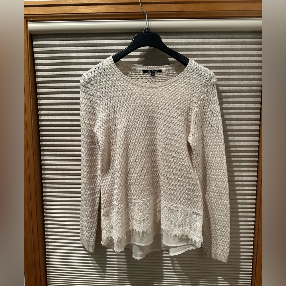 White woman’s sweater